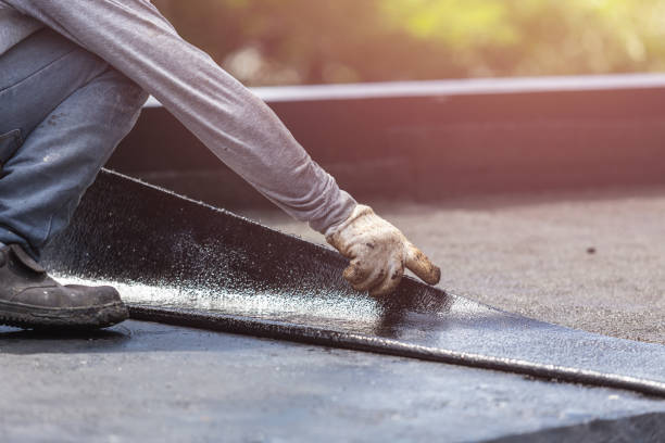 Professional Basement Waterproofing technician working in Berryville, VA